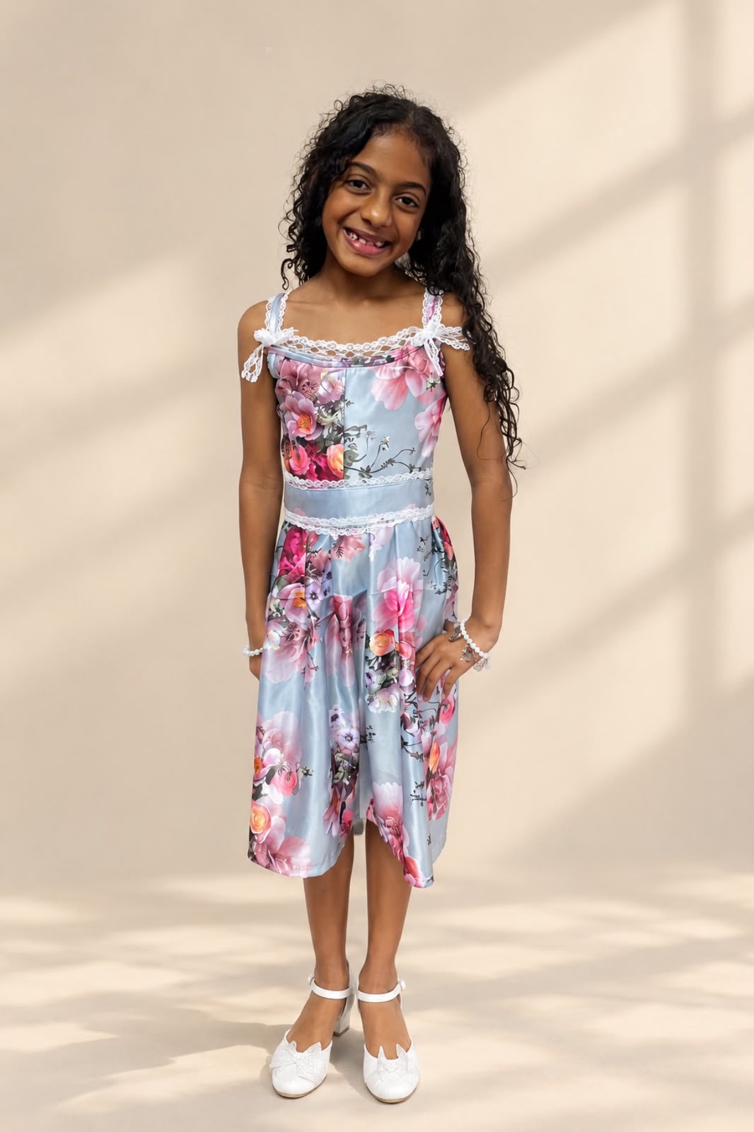 Girl's blue floral dress with lace straps and lace waistband